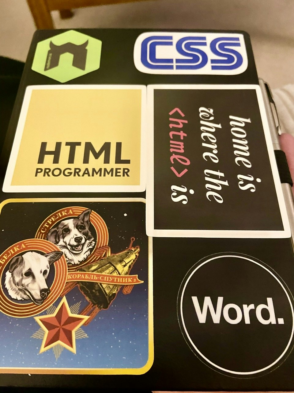 My bullet journal cover with a few stickers on it